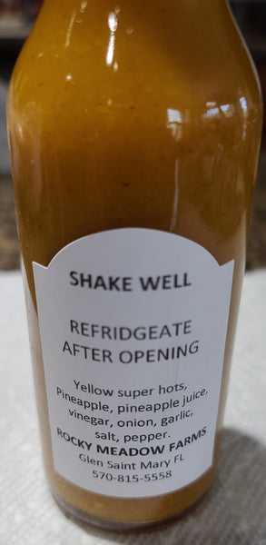 Ingredients: Yellow Super Hot Peppers, Pineapple, Pineapple Juice, Vinegar, Onion, Garlic, Salt, Black Pepper