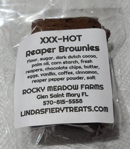 BROWNIE - XXX Reaper Brownie - A very rich chocolate brownie made with both Reaper powder and Fresh Reaper Peppers.. It a sure way to light up your desert craving. - Ingredients: Flour, Dark Dutch Cocoa, Palm Oil, Corn Starch, Chocolate Chips, Butter, Eggs, Vanilla, Coffee, Cinnamon, Reaper Pepper Powder, Salt