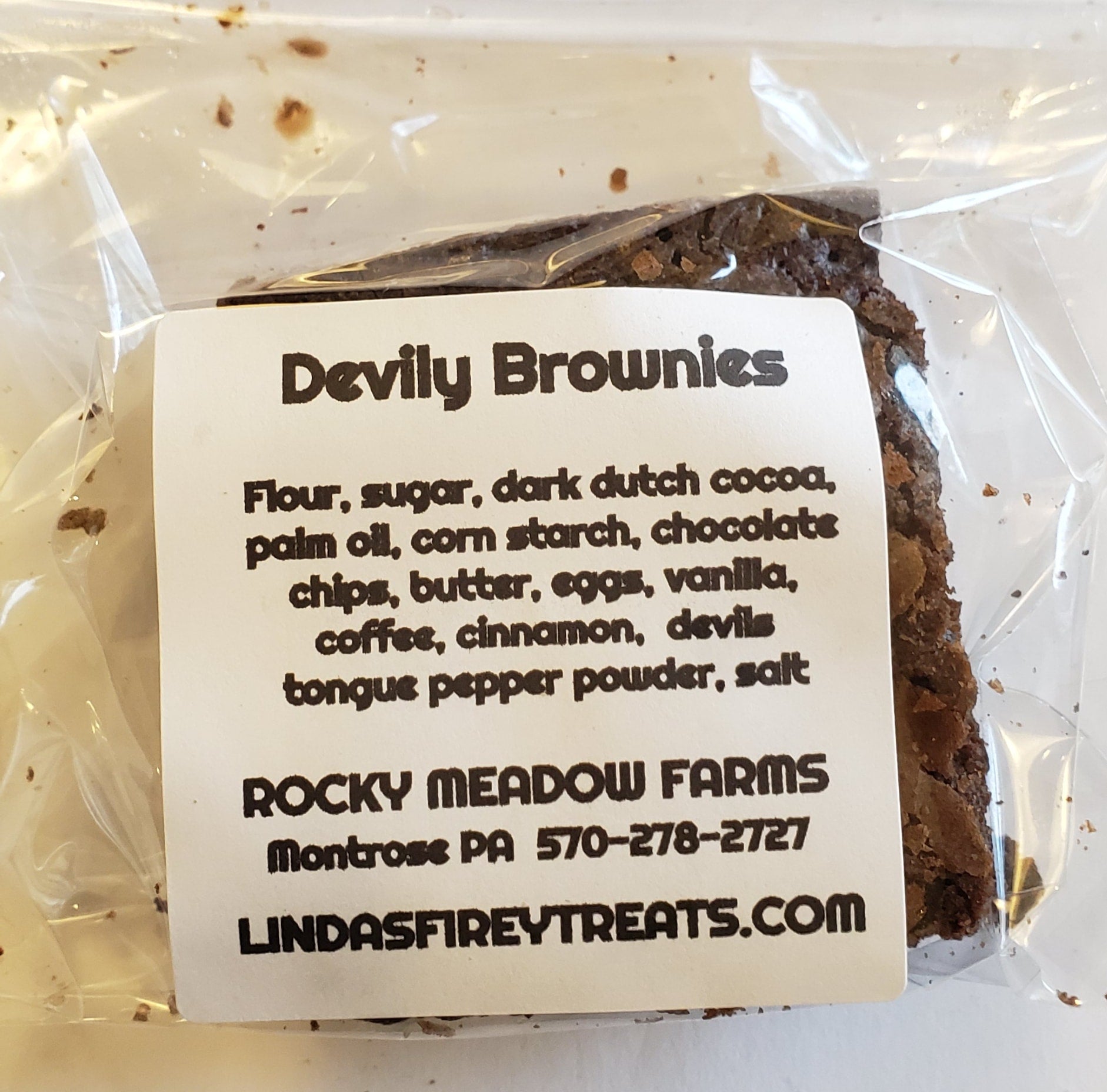 Devily Brownies - A spiked up version of our Very Chocolatey Brownie with Devil's Tongue powder and fresh Devil's Tongue peppers. Rich and creamy in texture and flavor.  The Devil's Tongue pepper is a medium heat pepper similar to the Habanero but with it's own unique flavor. Best described as getting some of that Super Hot taste without the extreme burn. - Ingredients: Flour, Dark Dutch Cocoa, Palm Oil, Corn Starch, Chocolate Chips, Butter, Eggs, Vanilla, Coffee, Cinnamon, Devils Tongue Pepper Powder, Salt