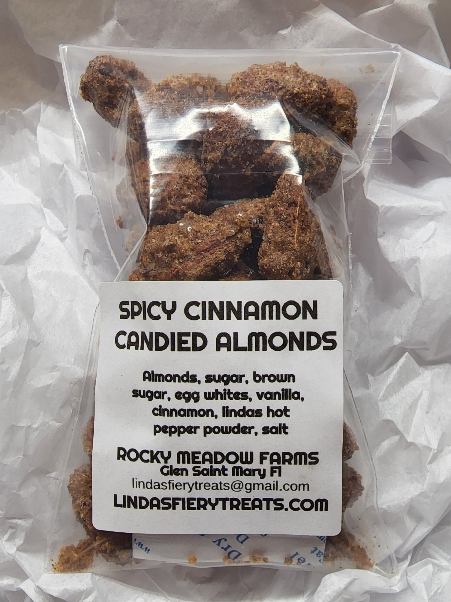 ALMONDS - Spicy Cinnamon Almonds - A mild candied Almond with nice cinnamon flavor - Ingredients: Almonds, Sugar, Brown Sugar, Egg Whites, Vanilla, Cinnamon, "Linda's hot pepper powder", Salt